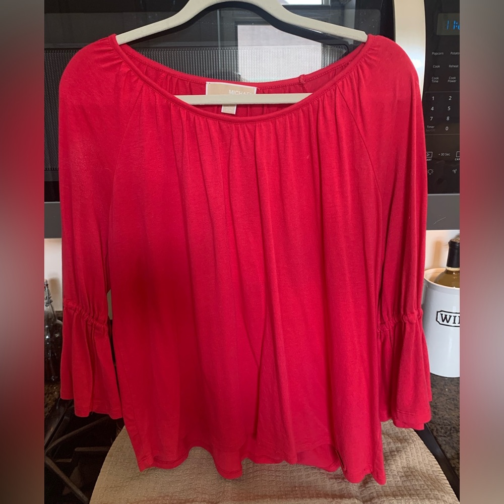Michael Kore’s Knit top with drawstring sleeves
